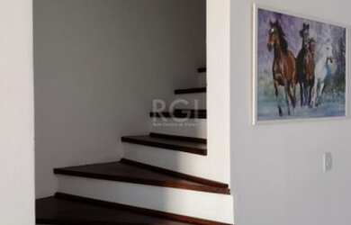 Imagem 5: Casa em Guarujá. Churrasqueira, Lareira, 2 Vagas na garageme3 Dormitórios