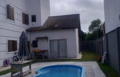 Imagem: A casa possui 3 Dormitórios, 3 Banheiros, 2 Vagas na garagem