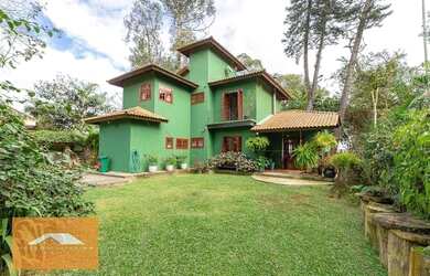 Imagem: A casa possui 3 Dormitórios, 5 Banheiros, 5 Vagas na garagem