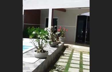 Imagem: A casa em condomínio possui 4 Dormitórios e 4 Banheiros e