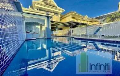 Imagem: A casa em condomínio possui 4 Dormitórios, 5 Banheiros, 3