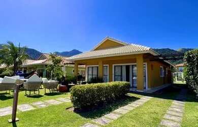 Imagem: A casa possui 3 Dormitórios, 5 Banheiros, 3 Vagas na garagem