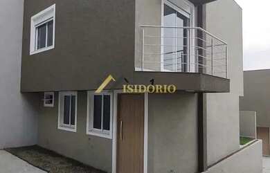 Imagem: A casa possui 3 Dormitórios, 3 Banheiros, 2 Vagas na garagem