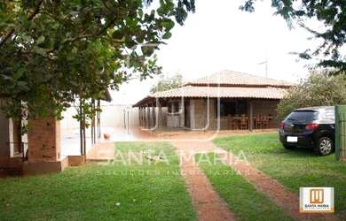 Imagem: A casa possui 4 Dormitórios, 1 Banheiro, 5 Vagas na garagem