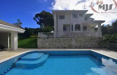 Imagem: A casa possui 4 Dormitórios, 5 Banheiros, 2 Vagas na garagem