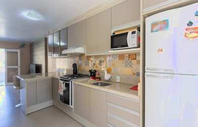 Imagem 16: Casa em Guarujá. Churrasqueira, Varanda, Área de serviçoe94m² de Área