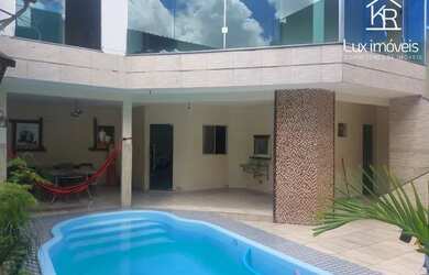 Imagem: A casa possui 5 Dormitórios, 5 Banheiros, 4 Vagas na garagem