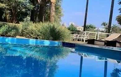 Imagem: A casa em condomínio possui 4 Dormitórios, 5 Banheiros, 5