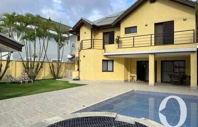 Imagem: A casa em condomínio possui 4 Dormitórios, 5 Banheiros, 4