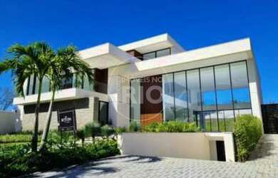 Imagem: A casa em condomínio possui 5 Dormitórios, 5 Banheiros, 5