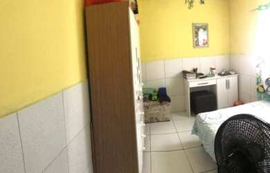 Imagem: A casa possui 2 Dormitórios, 2 Banheiros, 3 Vagas na garagem