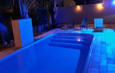 Imagem: A casa possui 3 Dormitórios, 3 Banheiros, 4 Vagas na garagem