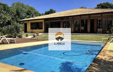 Imagem: A casa em condomínio possui 4 Dormitórios, 5 Banheiros, 5