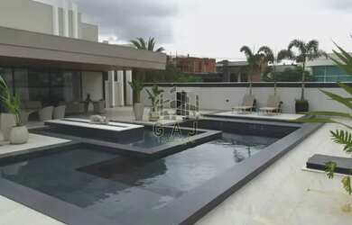 Imagem: A casa em condomínio possui 5 Dormitórios, 5 Banheiros, 5