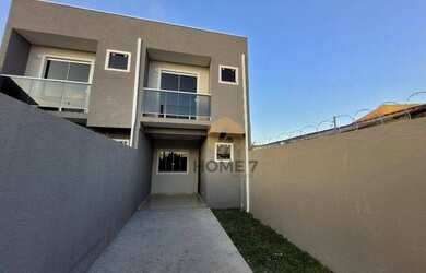 Imagem: A casa possui 3 Dormitórios, 2 Banheiros, 2 Vagas na garagem