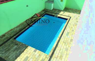 Imagem: A casa possui 3 Dormitórios, 2 Banheiros, 2 Vagas na garagem