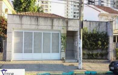 Imagem: A casa possui 3 Dormitórios, 4 Banheiros, 3 Vagas na garagem