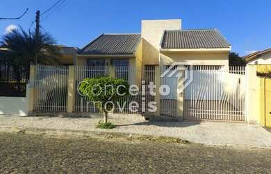 Imagem: A casa possui 3 Dormitórios, 2 Banheiros, 2 Vagas na garagem