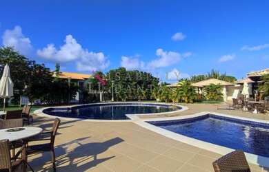 Imagem: A casa possui 2 Dormitórios, 3 Banheiros, 2 Vagas na garagem