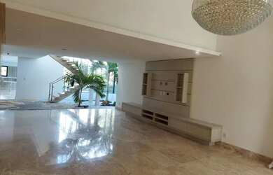 Imagem: A casa em condomínio possui 4 Dormitórios, 5 Banheiros, 5