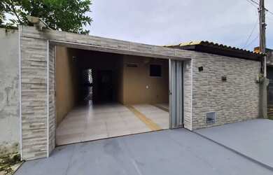 Imagem: A casa possui 3 Dormitórios, 3 Banheiros, 3 Vagas na garagem