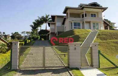 Imagem: A casa em condomínio possui 3 Dormitórios, 2 Banheiros e 326m²