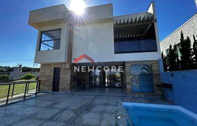 Imagem: A casa possui 5 Dormitórios, 5 Banheiros, 4 Vagas na garagem