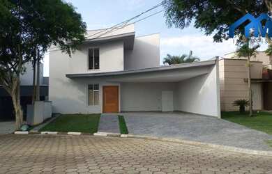 Imagem: A casa em condomínio possui 4 Dormitórios, 5 Banheiros, 4