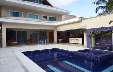 Imagem: A casa em condomínio possui 5 Dormitórios, 5 Banheiros, 3