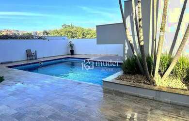 Imagem: A casa em condomínio possui 4 Dormitórios, 5 Banheiros, 4