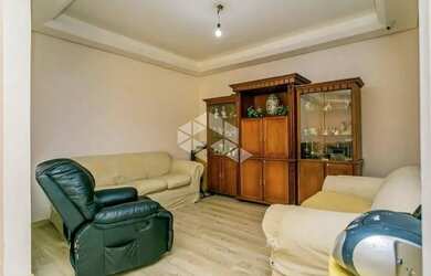 Imagem 7: Apartamento de 113m2, living em 3 ambientes cercado por jardim de inverno