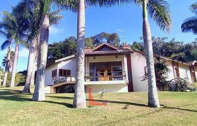 Imagem: A casa em condomínio possui 4 Dormitórios, 4 Banheiros, 5