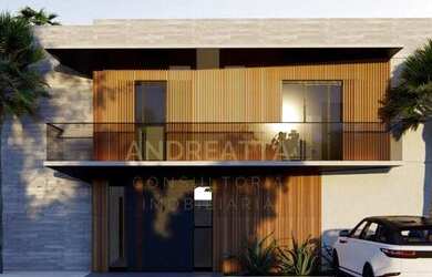 Imagem: A casa possui 3 Dormitórios, 5 Banheiros, 2 Vagas na garagem