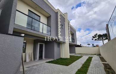 Imagem: A casa possui 3 Dormitórios, 3 Banheiros, 2 Vagas na garagem