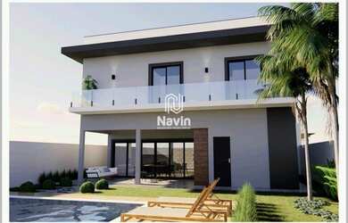 Imagem: A casa possui 3 Dormitórios, 4 Banheiros, 2 Vagas na garagem