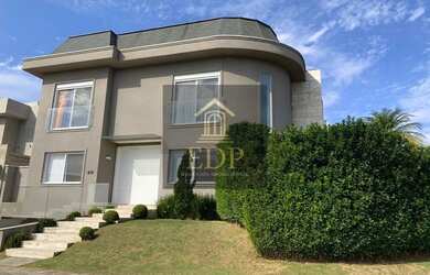 Imagem: A casa em condomínio possui 4 Dormitórios, 5 Banheiros, 4