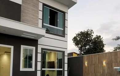 Imagem: A casa possui 3 Dormitórios, 3 Banheiros, 2 Vagas na garagem