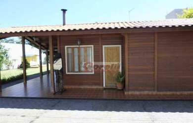 Imagem: A casa em condomínio possui 3 Dormitórios, 2 Banheiros, 5