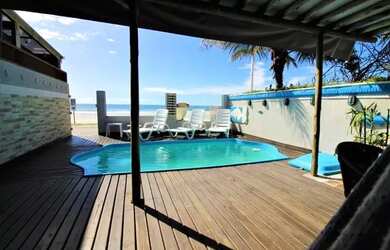 Imagem: A casa possui 4 Dormitórios, 4 Banheiros, 3 Vagas na garagem