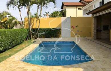 Imagem: A casa em condomínio possui 4 Dormitórios, 4 Banheiros, 4