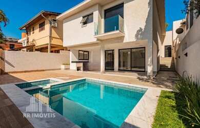 Imagem: A casa em condomínio possui 3 Dormitórios, 4 Banheiros, 4