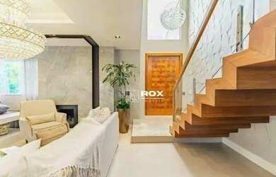 Imagem: A casa em condomínio possui 4 Dormitórios, 5 Banheiros, 5