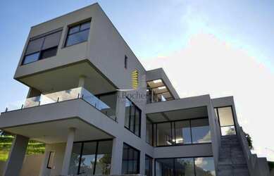 Imagem: A casa em condomínio possui 4 Dormitórios, 5 Banheiros, 4