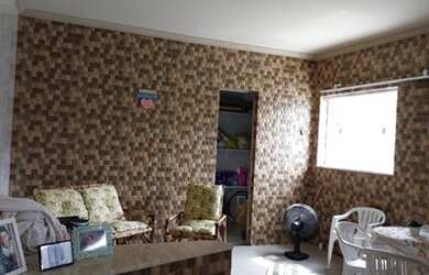 Imagem: A casa possui 3 Dormitórios, 4 Banheiros, 2 Vagas na garagem