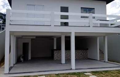 Imagem: A casa em condomínio possui 3 Dormitórios, 4 Banheiros, 2