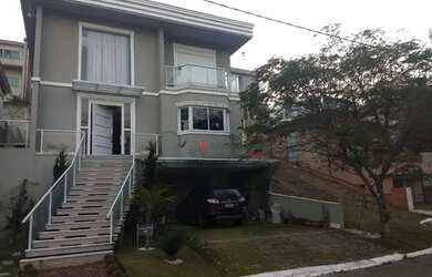 Imagem: A casa em condomínio possui 4 Dormitórios, 5 Banheiros, 4