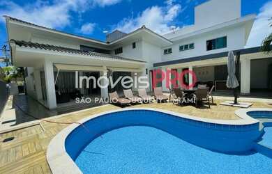 Imagem: A casa em condomínio possui 4 Dormitórios, 5 Banheiros, 4