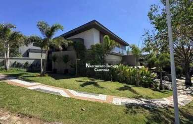 Imagem: A casa em condomínio possui 4 Dormitórios, 5 Banheiros, 4