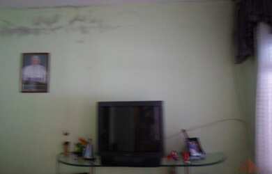 Imagem: A casa possui 2 Dormitórios, 1 Banheiro, 2 Vagas na garagem