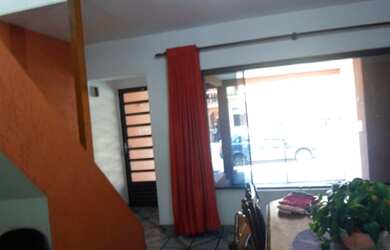 Imagem: A casa possui 4 Dormitórios, 3 Vagas na garagem e está localizado